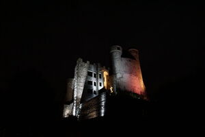 Castle grounds atmospherically illuminated with LED spotlights Castle Greifenstein in Germany